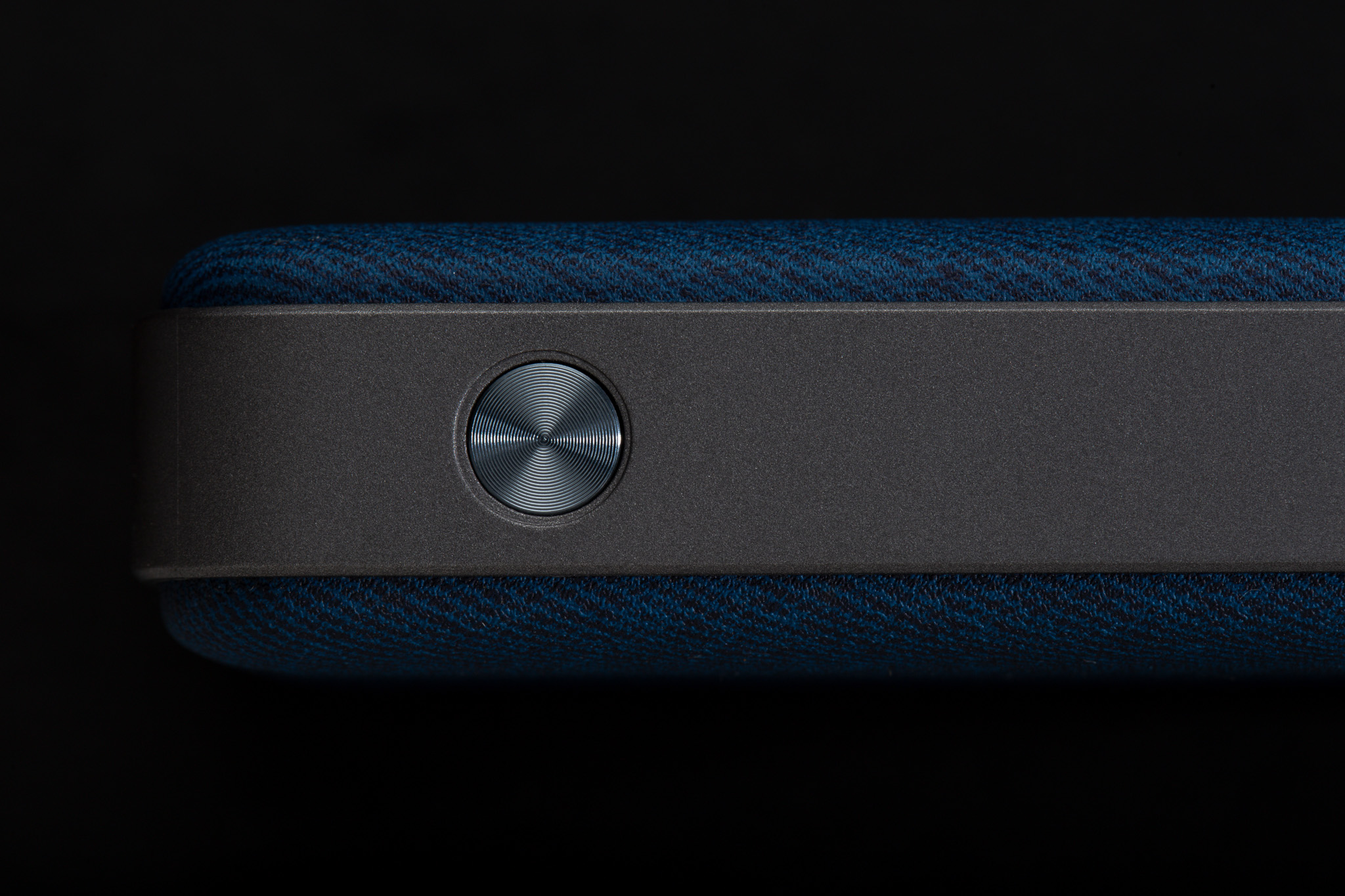 Alpex power bank on a black background, product photography