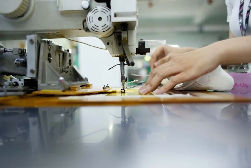 part of shoes is sewed with sewing machine